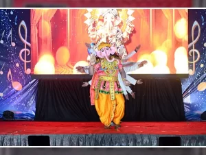 Young students dressed in vibrant costumes showcasing a cultural performance at the Annual Day of Holyhearts Public School, Attabira.